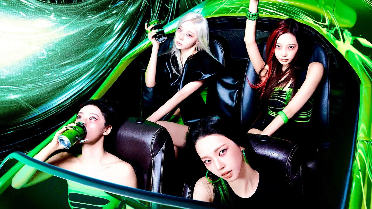 Four women posing inside a glossy black car with vibrant neon green lighting and abstract green light effects in the background.